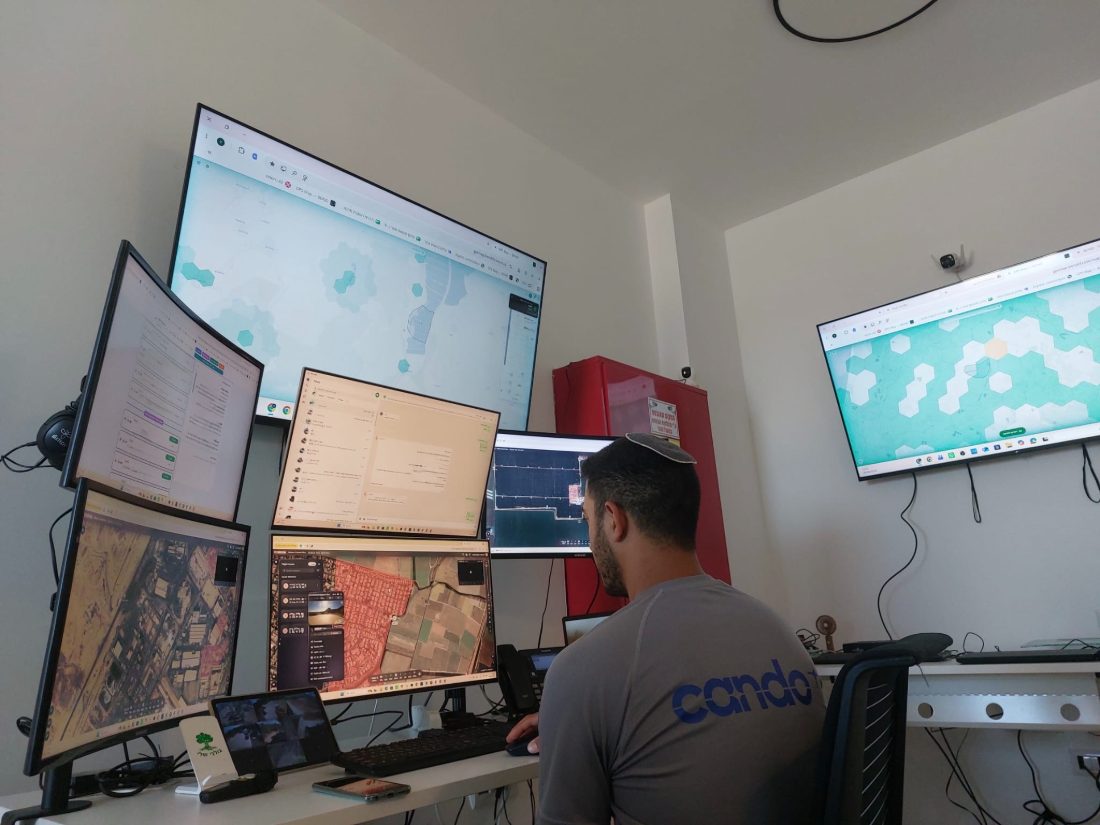 An operator working with the BOND map across several screens